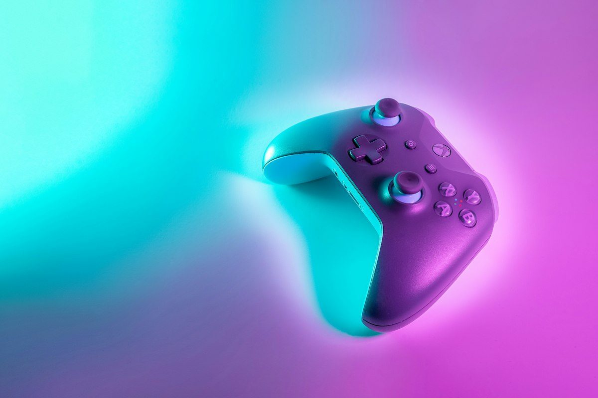 Controller under cyan and purple light